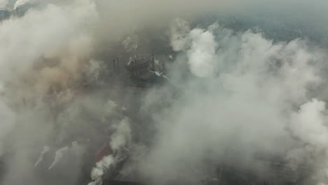 aerial view of an industrial pipe pollutes the air next to people living in the city. create a greenhouse effect