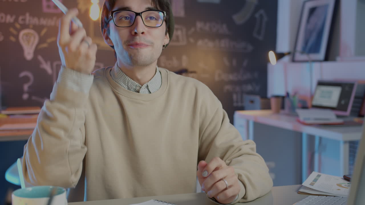 Young man working on computer in office