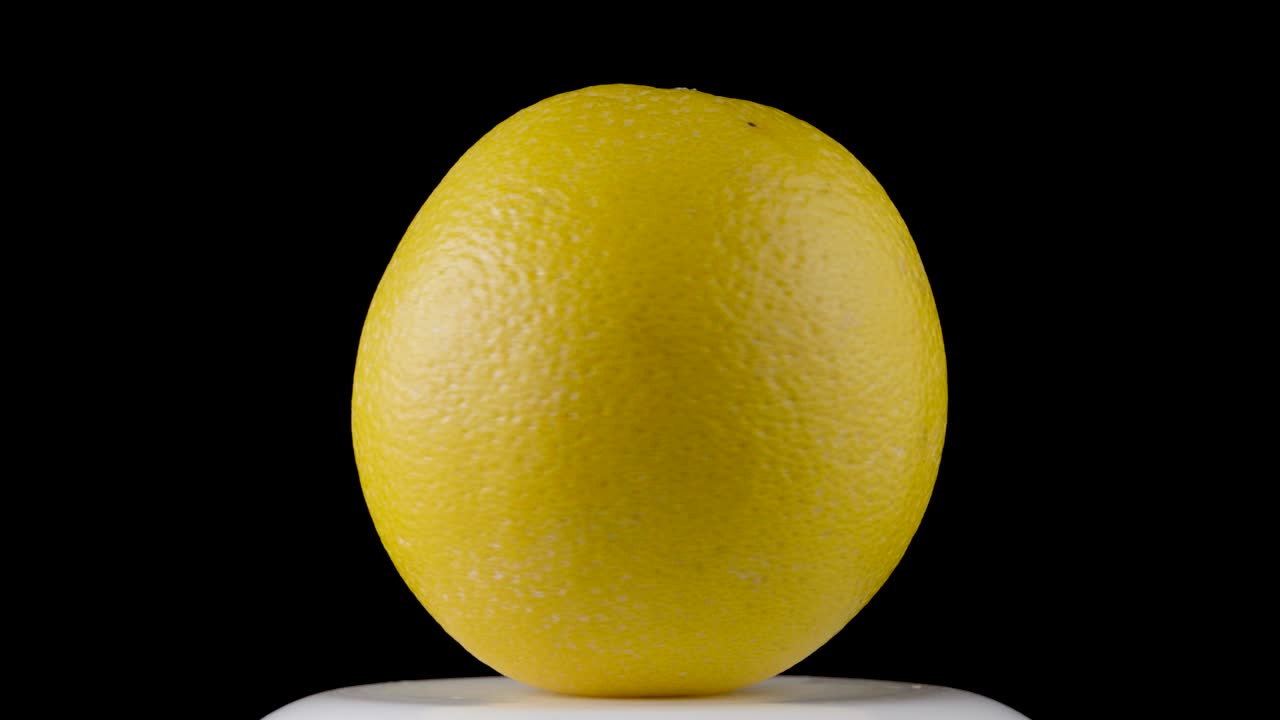 Rotating orange fruit