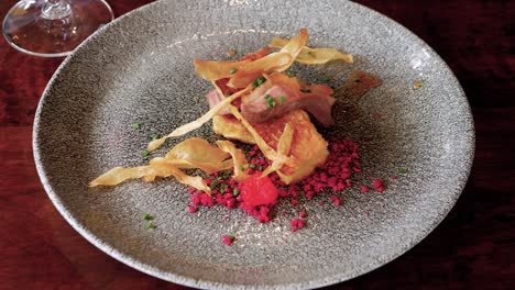 Right-to-left-pan-of-smoked-duck-breast-on-Brioche-French-toast-with-king-oyster-mushroom-chips