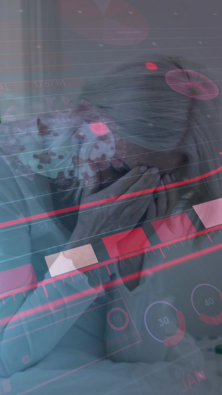 Animation of virus cells over senior caucasian woman in bed