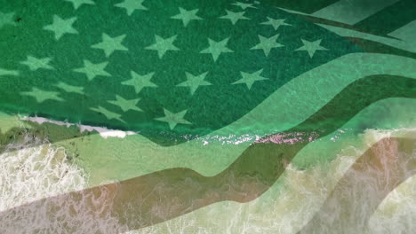 digital composition of waving us flag against aerial view of the sea waves