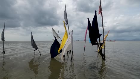 flags at the temple by the sea ,waterloo rd on the island of trinidad.