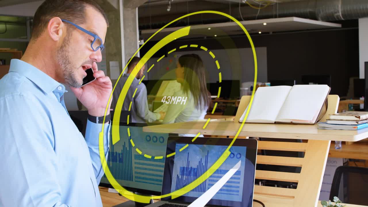 Man holding report and speaking on phone, call initiating HUD rotating and updating business charts