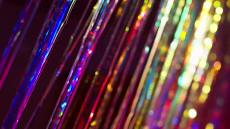 Shot-Of-Defocused-Tinsel-Curtain-In-Night-Club-Or-Disco-With-Reflected-Sparkling-Lights-1