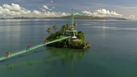 Locked-off-aerial-view-of-Bacuag-Hanging-Bridge-and-Octopus-Islet