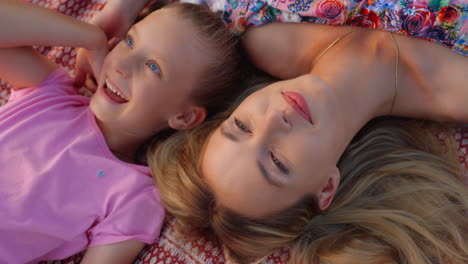 cute family relaxing in park