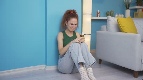 Suicide-woman-leaning-against-the-wall.