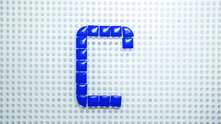stop motion of the letter G creating one pixel at the time, made with children toys