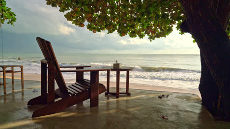 empty wooden chair with beach sea background