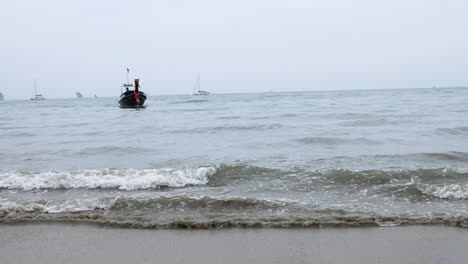 tranquil beach scene with boat at sea