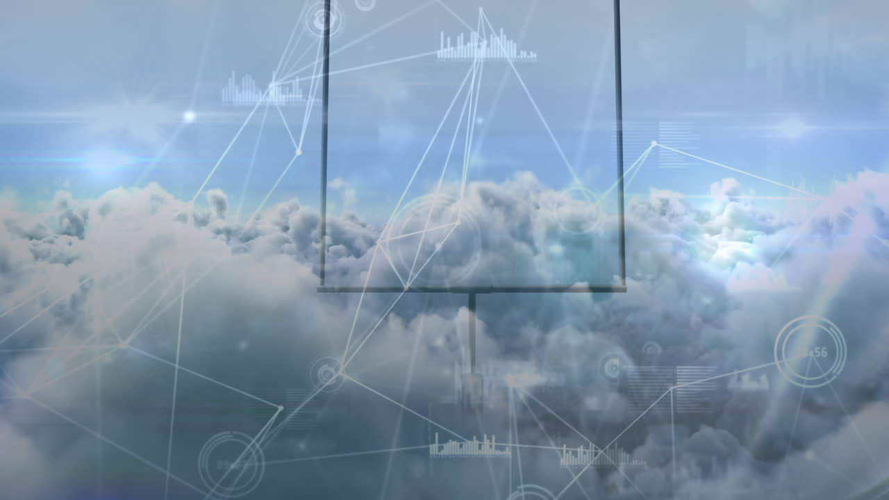 럭비 골 포스트에 대항하여 하늘의 구름 위에 회전하는 연결망