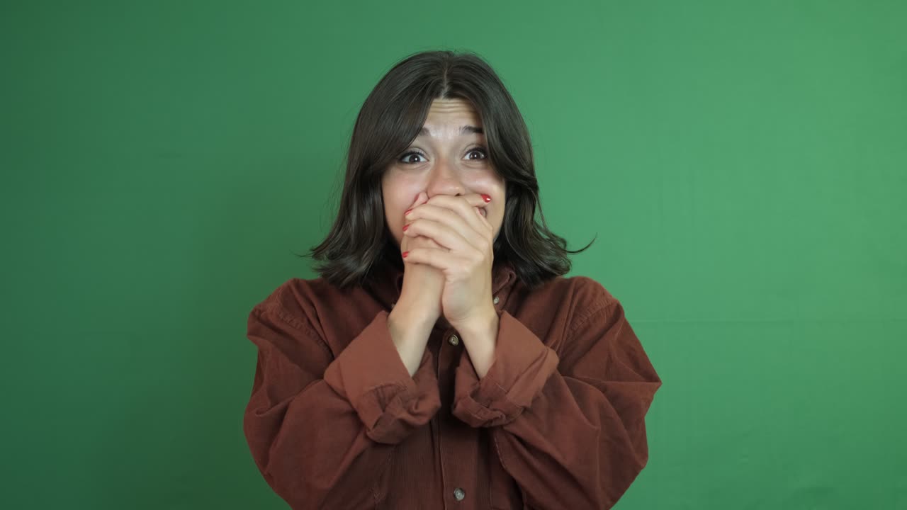 expresión de mujer conmocionada