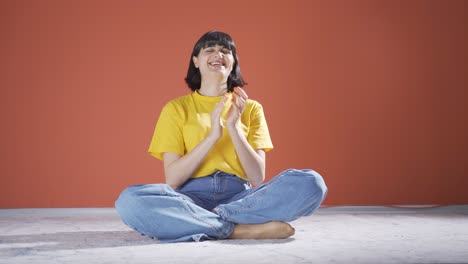 Woman-giving-greeting-and-applause-to-camera.