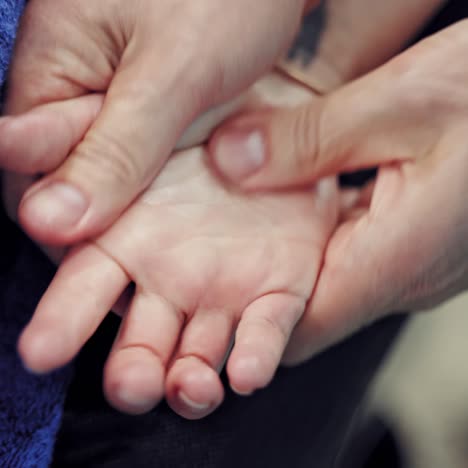therapist doing massage of hands