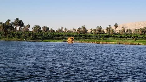 hut on an islet in the nile river