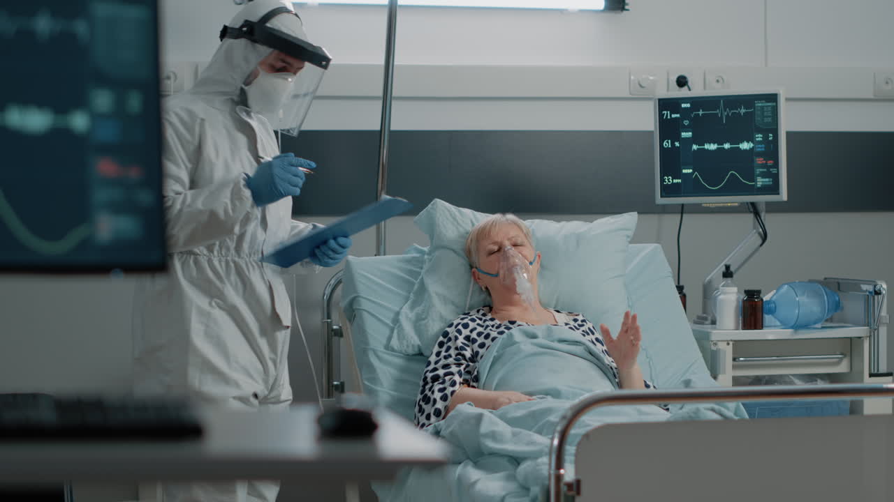 Medic consulting patient with coronavirus about healthcare