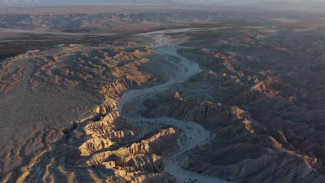 desert badlands canyon with rugged rock formations, aerial