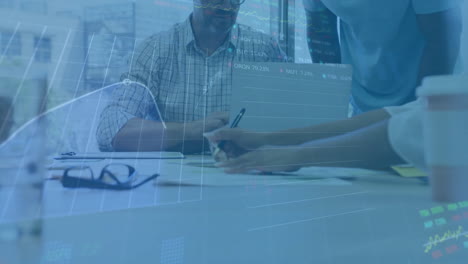 animation of financial data processing over diverse business people using laptop