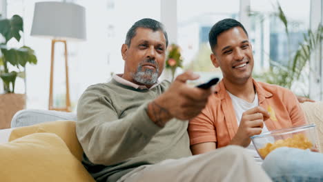 Watching-tv,-remote-and-father