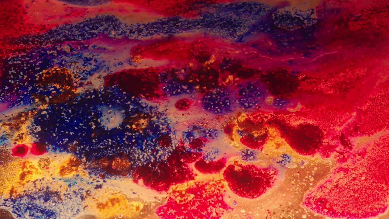 Colourful, organic, liquids macro shots buzzing and flowing