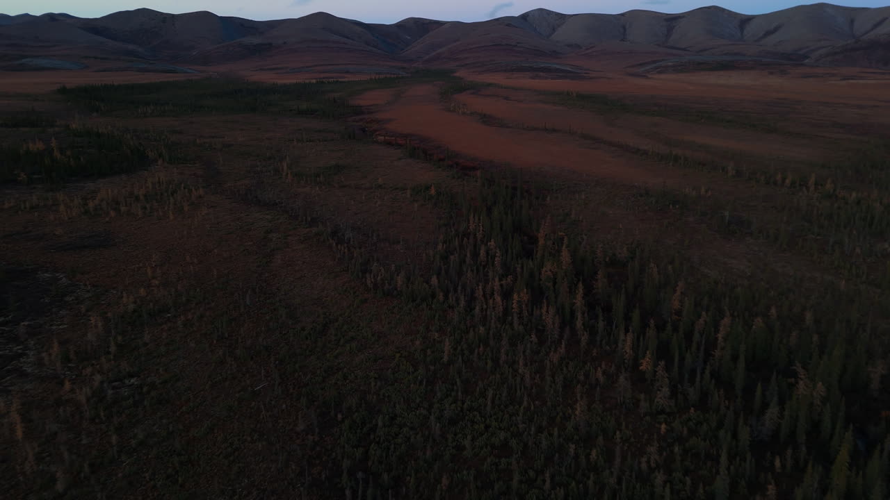 Aerial Of Arctic Circle Landscape At Dusk In Yukon, Canada. wide shot