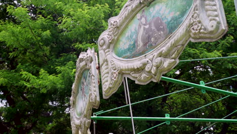 Close-up-of-carousel-signage-in-an-amusement-park