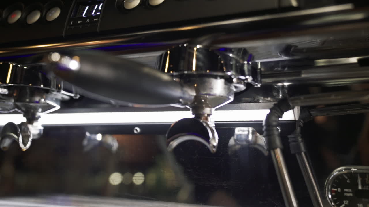 Coffee machine on a wooden table Slow motion