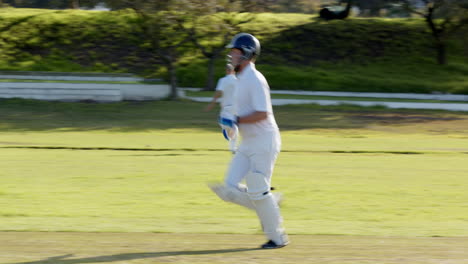 playing cricket, batsman walking off field while teammates celebrate in background