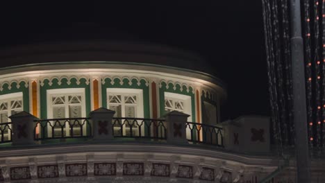 ornate building at night with christmas lights