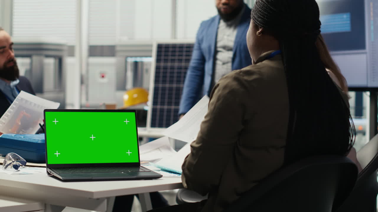 Researcher Analyzes Prototypes Using Laptop To Optimize Energy Production