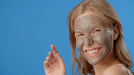 woman with clay mask
