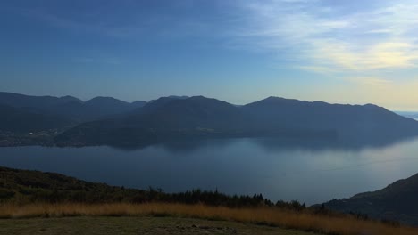 panoramic panning scenic view of lake maggiore seen from monte carza viewpoint