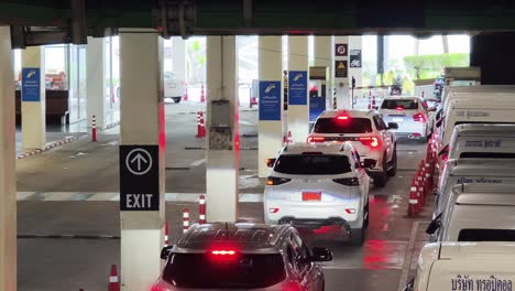 cars in a parking garage exit