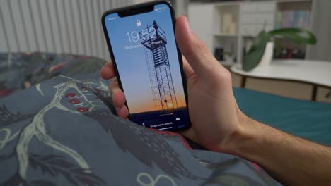 pov: checking phone in the bed