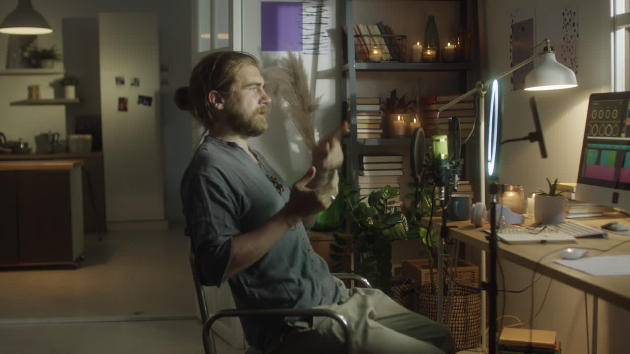 Man Live Streaming on Social Media at Home Studio
