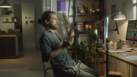man live streaming on social media at home studio