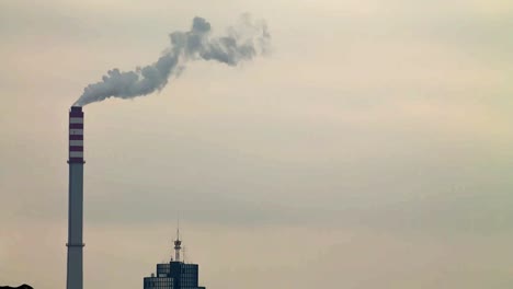 timelapse of a heatingplant chimney