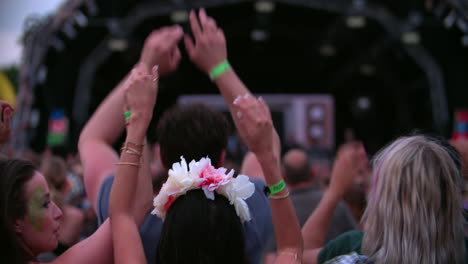 Back-view-of-friends-in-the-audience-at-a-music-festival