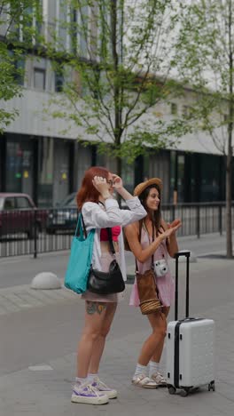 two women traveling in the city