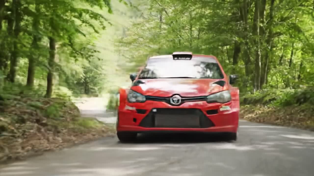 Rally Car Driving Through a Forest