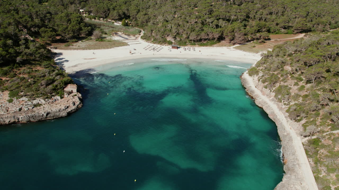 Aerial Drone View Of Blue Lagoons At Playa S&rsquo;Amarador In Cala Mondrago, Mallorca, Spain