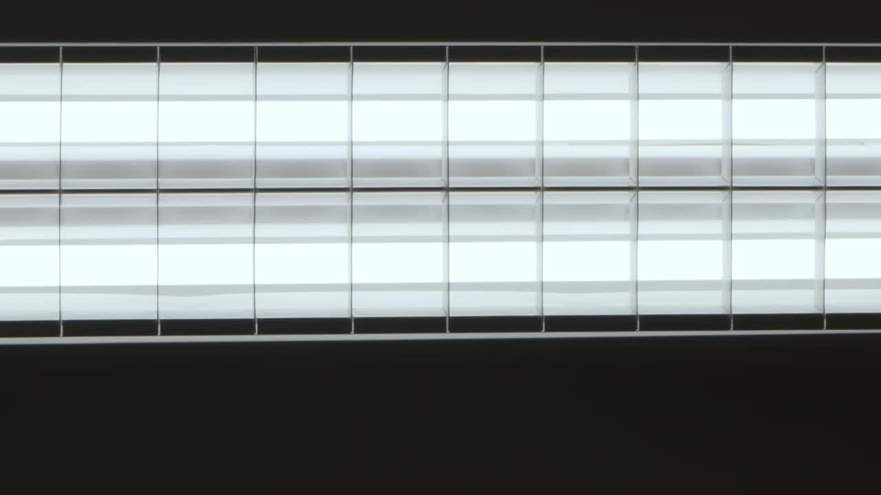 Fluorescent lights turning on and off, close-up