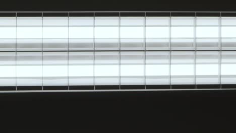 fluorescent lights turning on and off, close-up