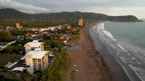 High-aerial-view-of-Jaco-Beach-Costa-Rica-with-river-and-hotels