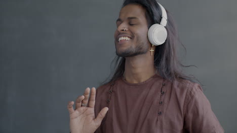 man enjoying music with headphones