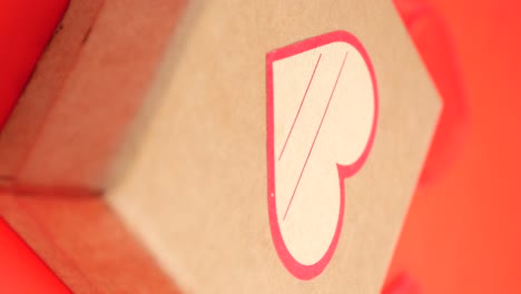 brown gift box with red heart
