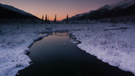 icy eagle river in alaska in chugach state park