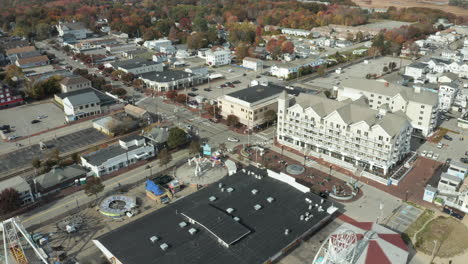 Drone-shot-of-quiet-beach-town-in-autumn,-Old-Orchard-Maine