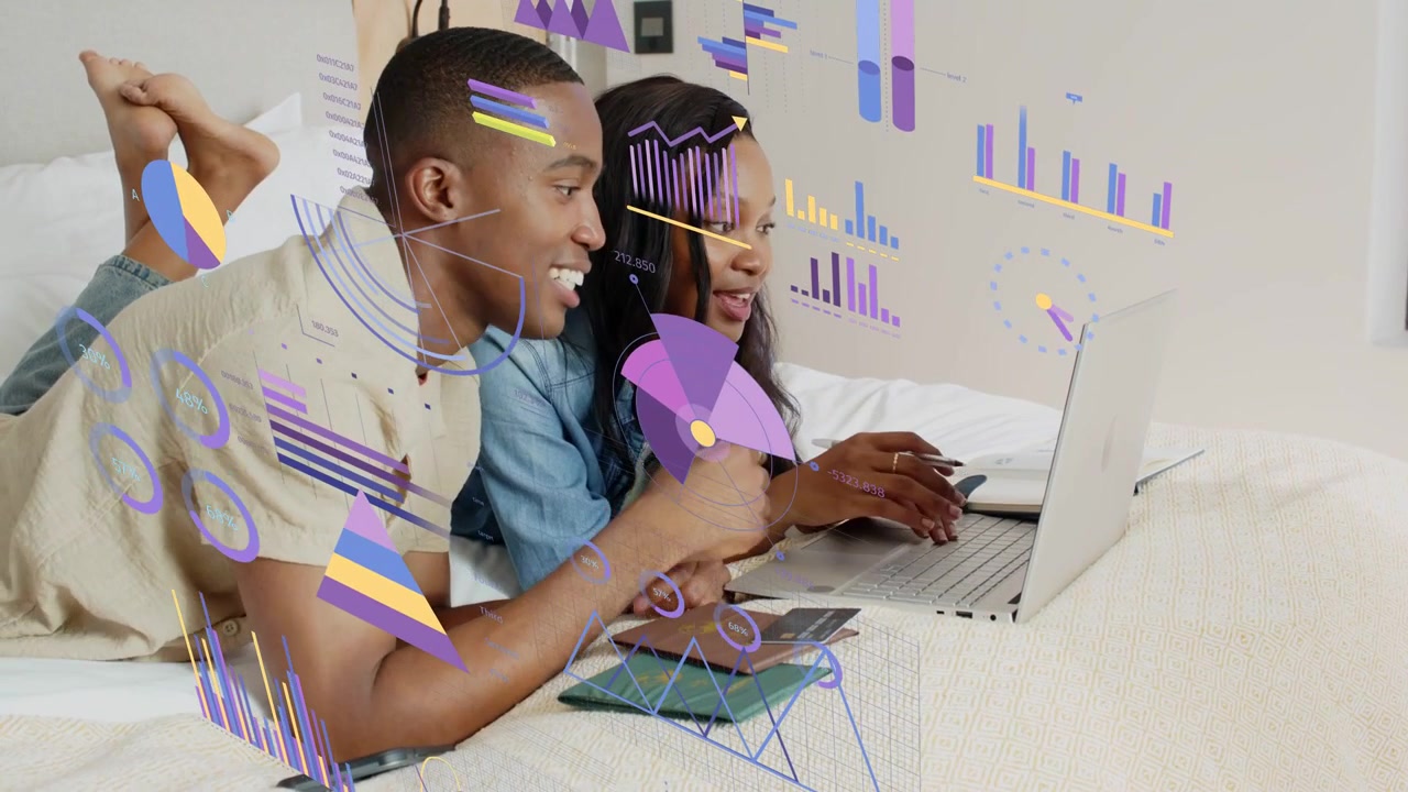 Man holding card and woman typing on laptop on bed, activating animated finance charts for booking
